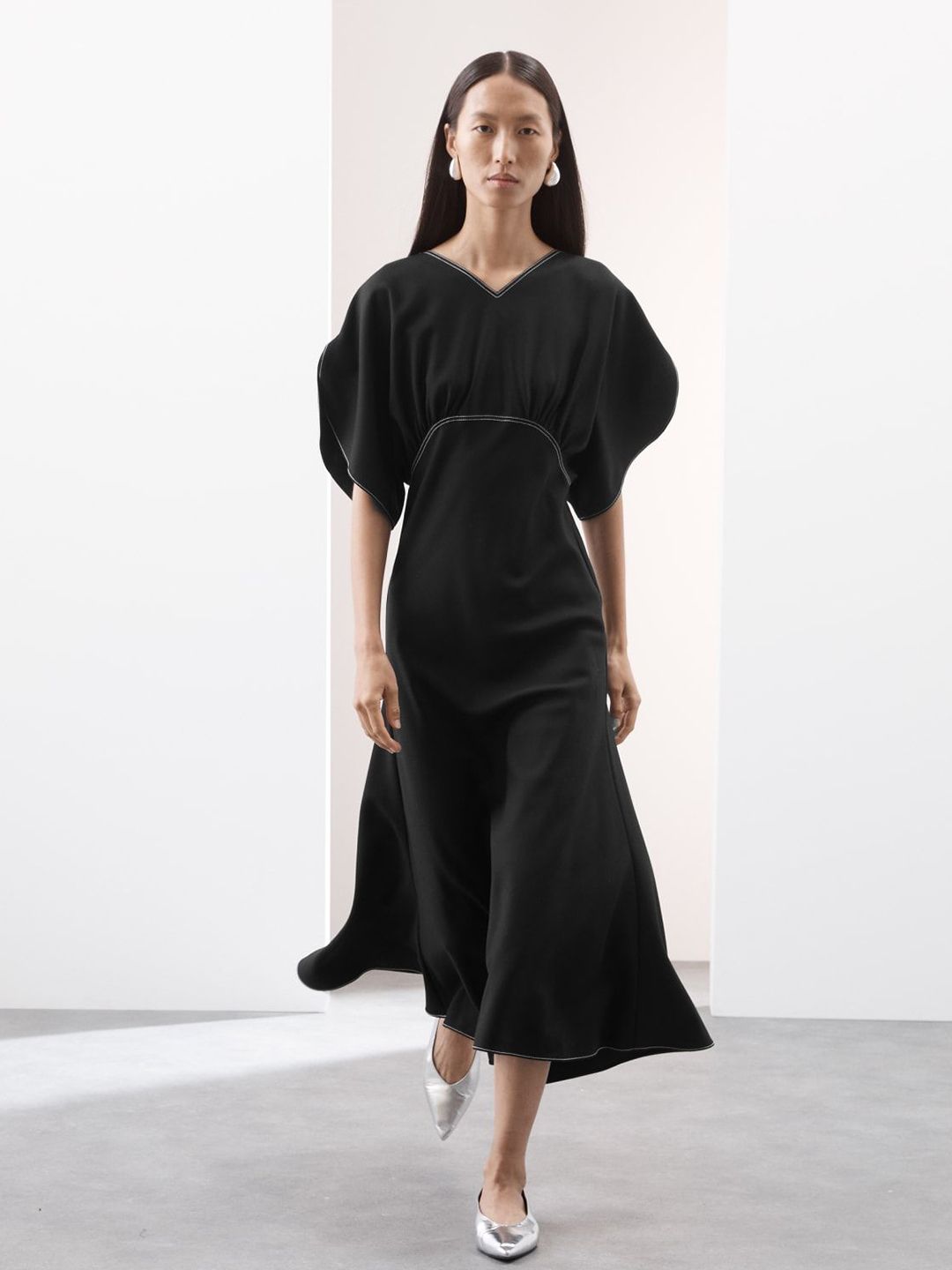 brNoZwUp_cf5ddecf3c044147aaf99b97ae2a5ceb.jpg Women Woollen Empire Dress - Image 1